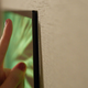 LG’s new flagship is so skinny that its guts won’t fit in the display.